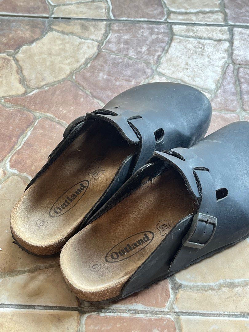 Outland Black Clogs Size 6 (Category: Flats & Sandals) located in Cavite. Submitted by armynavyofficial (Listing ID 1412420025, Image 2). Description: Outland clogs in black Birkenstock clogs dupe - Size: 6 - Features: - Buckle closure (not yet rusted) - Cork footbed - Leather insole - Perfect for casual wear - Condition: Good Can do meetups in Bacoor, Cavite and Makati area. .