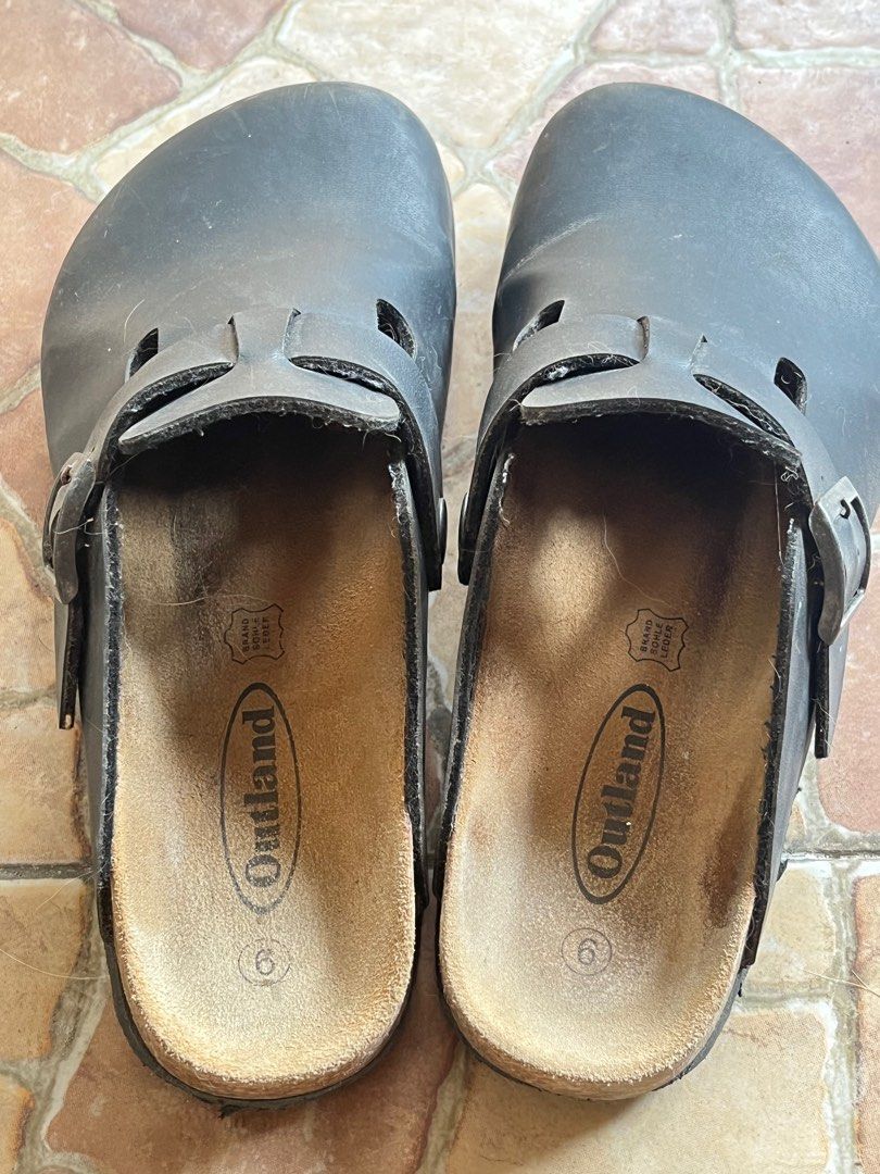Outland Black Clogs Size 6 (Category: Flats & Sandals) located in Cavite. Submitted by armynavyofficial (Listing ID 1412420025, Image 3). Description: Outland clogs in black Birkenstock clogs dupe - Size: 6 - Features: - Buckle closure (not yet rusted) - Cork footbed - Leather insole - Perfect for casual wear - Condition: Good Can do meetups in Bacoor, Cavite and Makati area. .