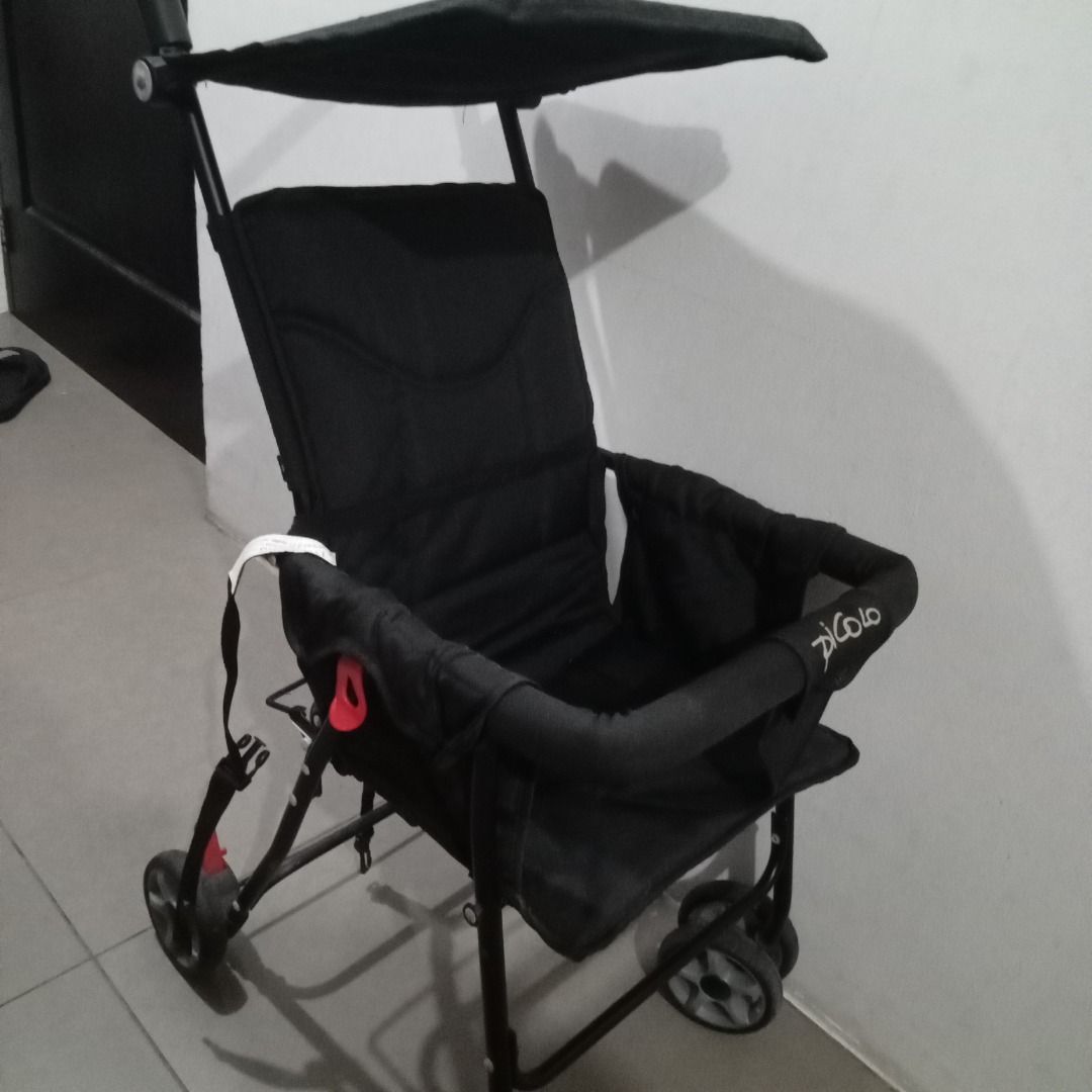 Piccolo Black Stroller (Category: Strollers) located in Quezon City. Submitted by emmesproject (Listing ID 1412394592, Image 3). Description: - Black Piccolo stroller - Includes sunshade - Comfortable seat - Folds for easy storage and transport - Four wheels for stability - Easy to maneuver 2-4 yr old RFS - di na ginagamit.