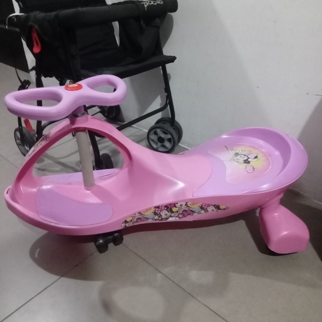 Pink Minnie Mouse Wiggle Car (Category: Kids Toys) located in Quezon City. Submitted by emmesproject (Listing ID 1412393369, Image 2). Description: - Minnie Mouse Wiggle Car - Fun pink design - Easy to use - Steering wheel included - Comfortable seat - Smooth, curved plastic design - Designed for kids to propel themselves by wiggling RFS- maguupgrade ng real bike.