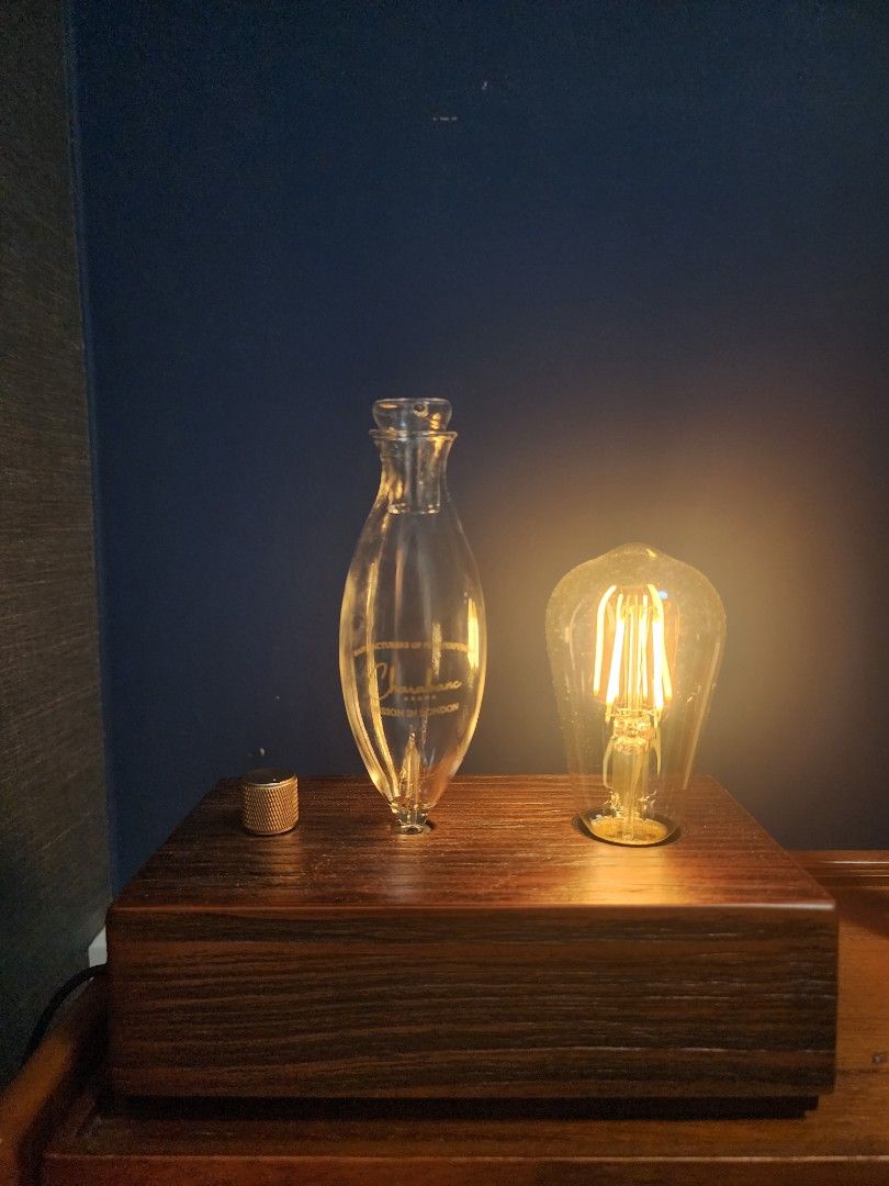 Retro Diffuser with light (Category: Home Fragrance) located in Singapore. Submitted by wiky_1708 (Listing ID 1412341699, Image 2). Description: Diffuser with light built in battery and rechargable (USB) Comes with light bulb Waterless essential oil Diffuser..