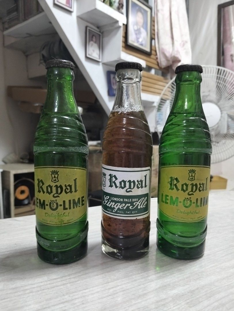 Royal Soda Bottles - Lemon-Lime and Ginger Ale (Category: Beverages) located in Manila. Submitted by jun_prudente (Listing ID 1412338408, Image 1). Description: - Vintage Royal Soda Bottles with content 600 each 1500 for 3 as set Lemon-Lime bottles (green) Ginger Ale bottle (clear) - All bottles with original labels - Collectible items.