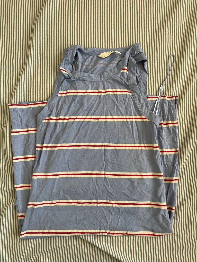 Striped Beach cover up Dress (Category: Dresses) located in Paranaque City. Submitted by mandsss21 (Listing ID 1412366583, Image 2). Description: - Sleeveless dress - Blue base with red and white horizontal stripes - Round neckline - Straight silhouette - Lightweight fabric - Suitable for warm weather - Brand tag visible.