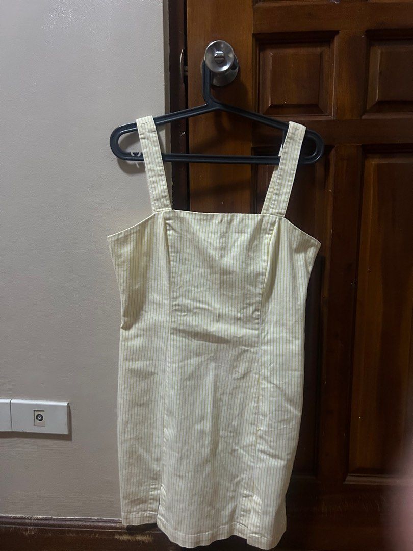 Striped Mini Dress (Category: Dresses) located in Quezon City. Submitted by sofierz (Listing ID 1412454661, Image 1). Description: - Striped mini dress - Square neckline - Thick straps - Back zipper closure - Light-colored fabric - Suitable for various occasions.