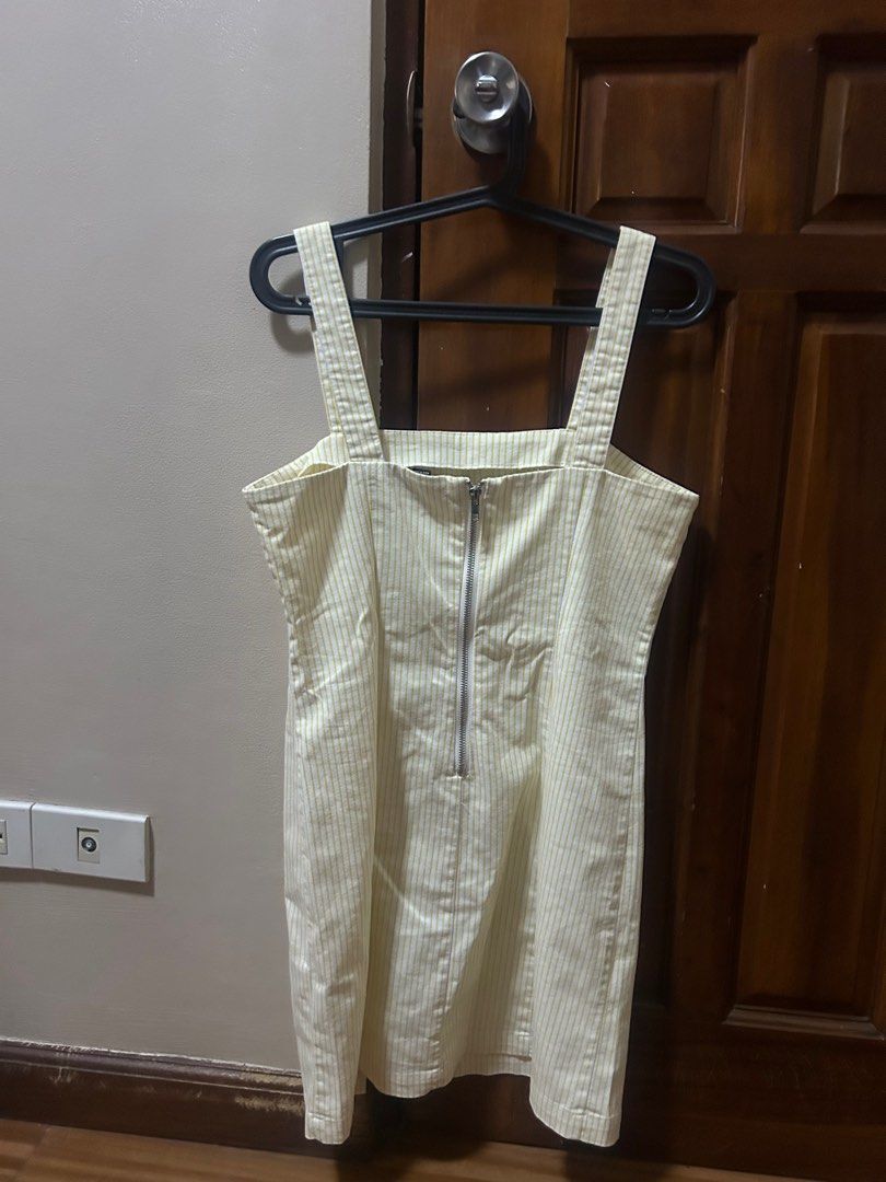 Striped Mini Dress (Category: Dresses) located in Quezon City. Submitted by sofierz (Listing ID 1412454661, Image 2). Description: - Striped mini dress - Square neckline - Thick straps - Back zipper closure - Light-colored fabric - Suitable for various occasions.