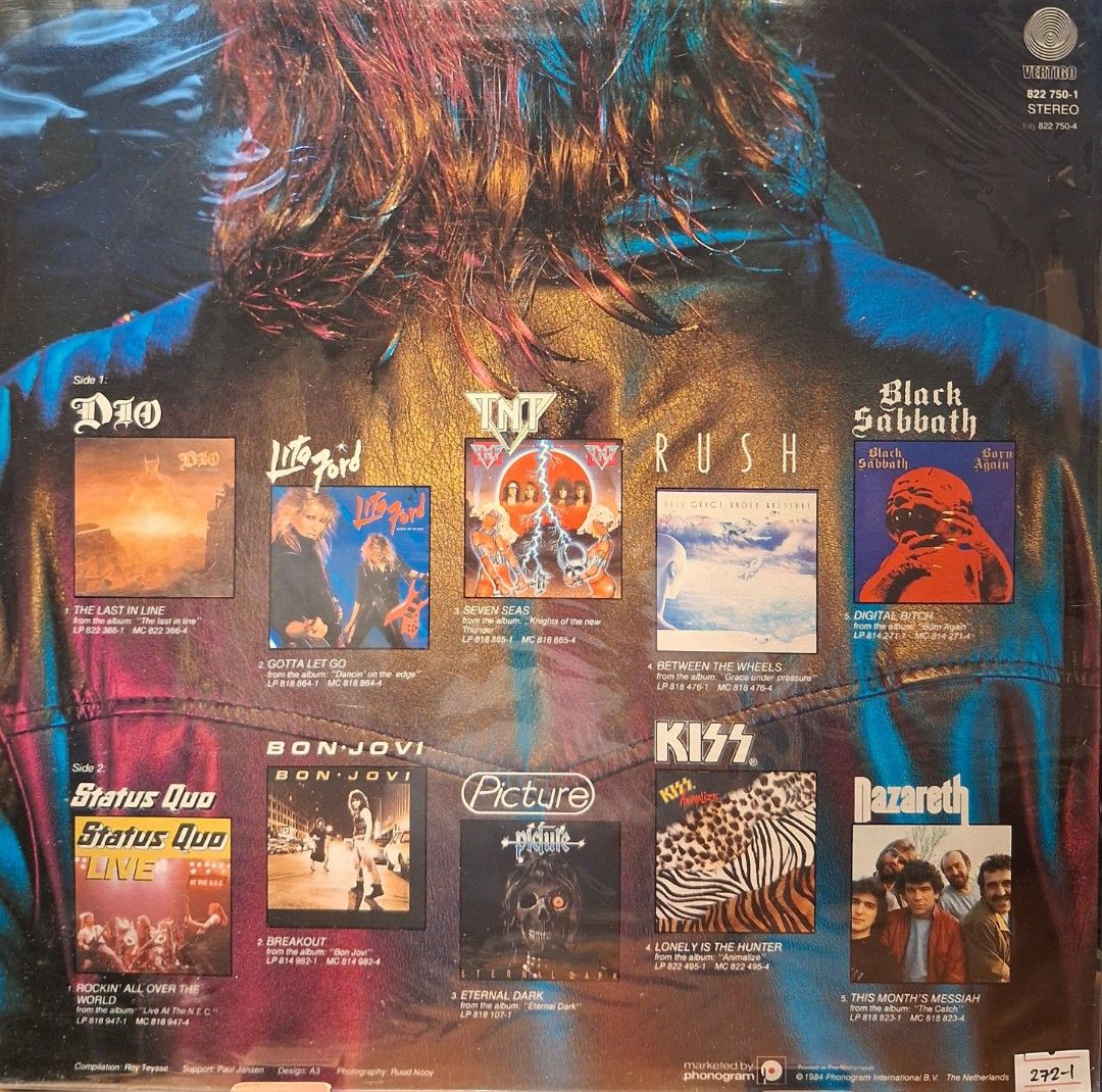 The Heavy Way Vinyl Record (Category: Vinyls) located in Quezon City. Submitted by pooh_laa (Listing ID 1412390355, Image 2). Description: - Rock vinyl record with artists: Dio, Lita Ford, Status Quo, Kiss, Bon Jovi, Nazareth, Rush, Picture, T.N.T., and Black Sabbath. - Includes a rock transfer. - Album cover art on the back. - Stereo pressing..