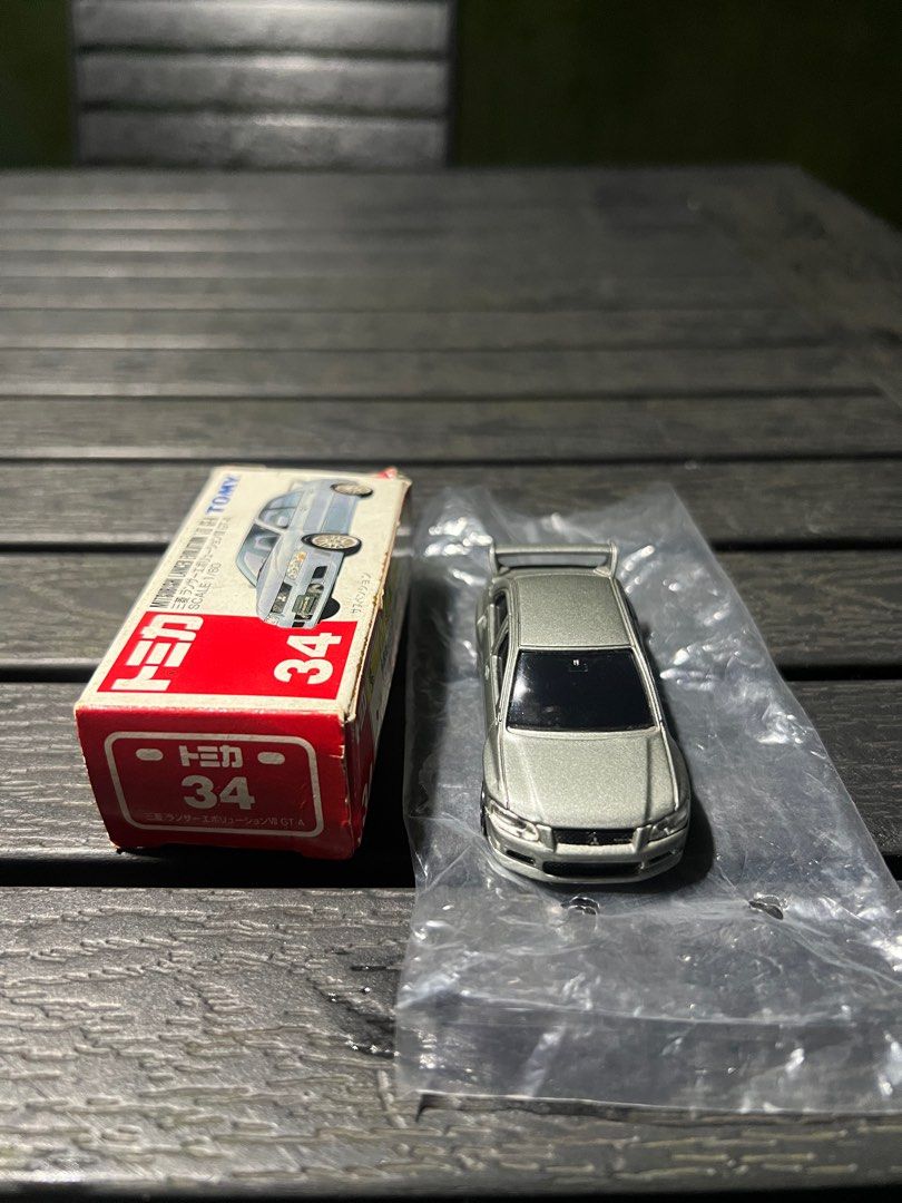 Tomica Mitsubishi Lancer Evolution VII GT-A (No. 34) (Category: Vehicle & Diecast Models) located in Santa Rosa. Submitted by _copman (Listing ID 1412467206, Image 3). Description: SUPER RARE! Comes with original box and plastic inserts. Vintage and Collectible Negotiable.
