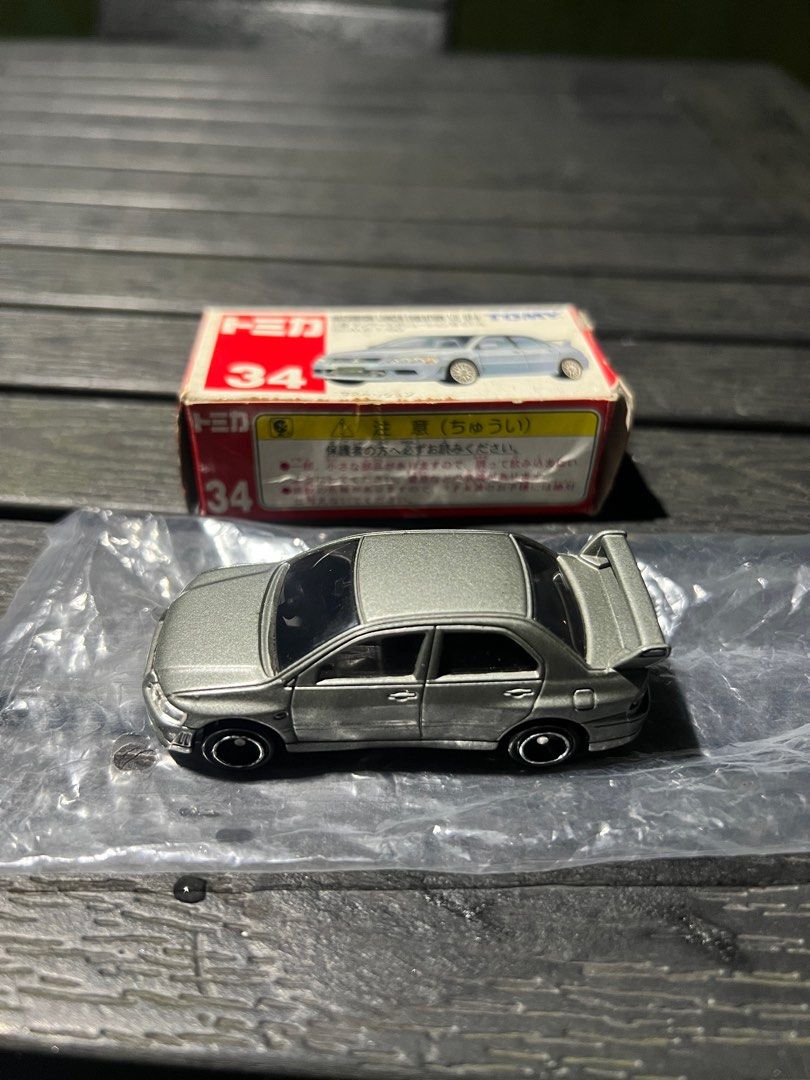 Tomica Mitsubishi Lancer Evolution VII GT-A (No. 34) (Category: Vehicle & Diecast Models) located in Santa Rosa. Submitted by _copman (Listing ID 1412467206, Image 2). Description: SUPER RARE! Comes with original box and plastic inserts. Vintage and Collectible Negotiable.