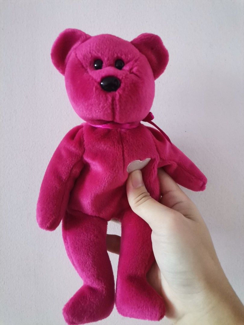 Ty Beanie Baby Valentina Bear (Category: Plushies & Soft Toys) located in Makati City. Submitted by kookybearsstuff (Listing ID 1412371808, Image 1). Description: - Ty Beanie Babies Valentina bear - Vibrant pink color - Heart-shaped patch on chest - Black nose and small eyes - Ribbon around neck - Tag attached - From US.