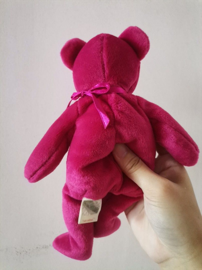 Ty Beanie Baby Valentina Bear (Category: Plushies & Soft Toys) located in Makati City. Submitted by kookybearsstuff (Listing ID 1412371808, Image 3). Description: - Ty Beanie Babies Valentina bear - Vibrant pink color - Heart-shaped patch on chest - Black nose and small eyes - Ribbon around neck - Tag attached - From US.