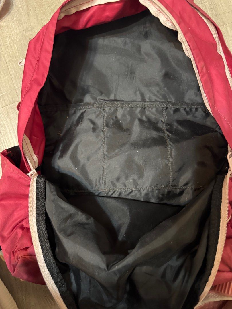 Under Armour Backpack (Category: Backpacks) located in Taguig. Submitted by whitechocolatechip (Listing ID 1412410963, Image 2). Description: - Red Under Armour backpack with black handle and straps. - Front pocket with Under Armour logo. - Multiple interior compartments, including a mesh pocket. - Zipper closure for security. - Adjustable straps for a comfortable fit. - Perfect for daily use - needs cleaning.