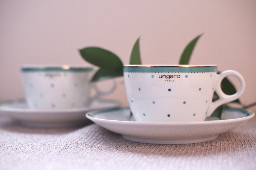 Ungaro Paris Tea Cup and Saucer Set (Category: Coffee & Tea Tableware) located in Binangonan. Submitted by pinkesceeluxe (Listing ID 1412477796, Image 1). Description: Elegant Ungaro Paris tea cup and saucer set. Php850 per set of cup and saucer - white base with blue polka dots and a teal and gold trim. - two cups and two saucers available - The cups have a comfortable handle and the saucers are a matching design. - Perfect for serving tea or co