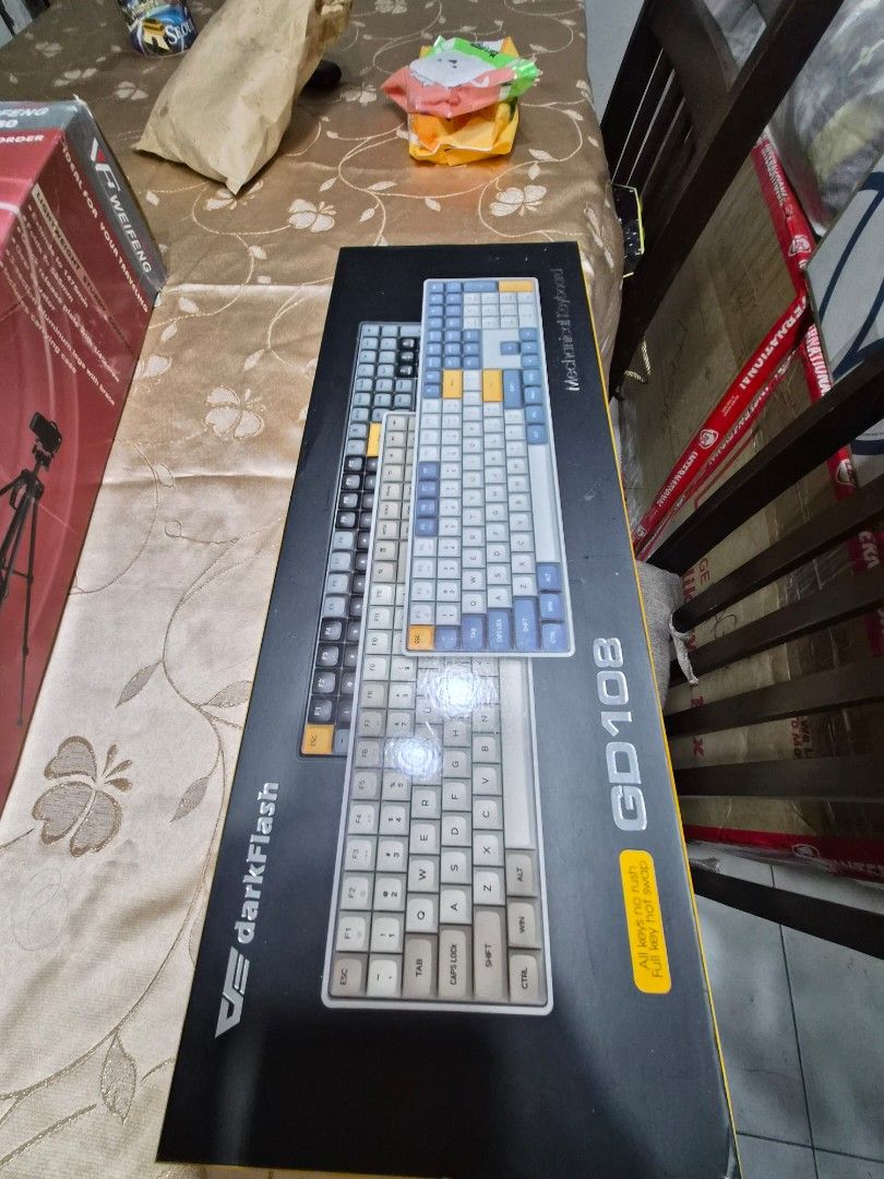 VE DarkFlash GD108 Mechanical Keyboard (Category: Computer Keyboard) located in Pasig City. Submitted by lahkaye (Listing ID 1412333003, Image 2). Description: - VE DarkFlash GD108 Mechanical Keyboard - Full-sized layout - White and blue keycap design - Yellow accent color - Includes original box * 1 keycap broken but can be replaced (key below F11) * moded-dampened with foam.