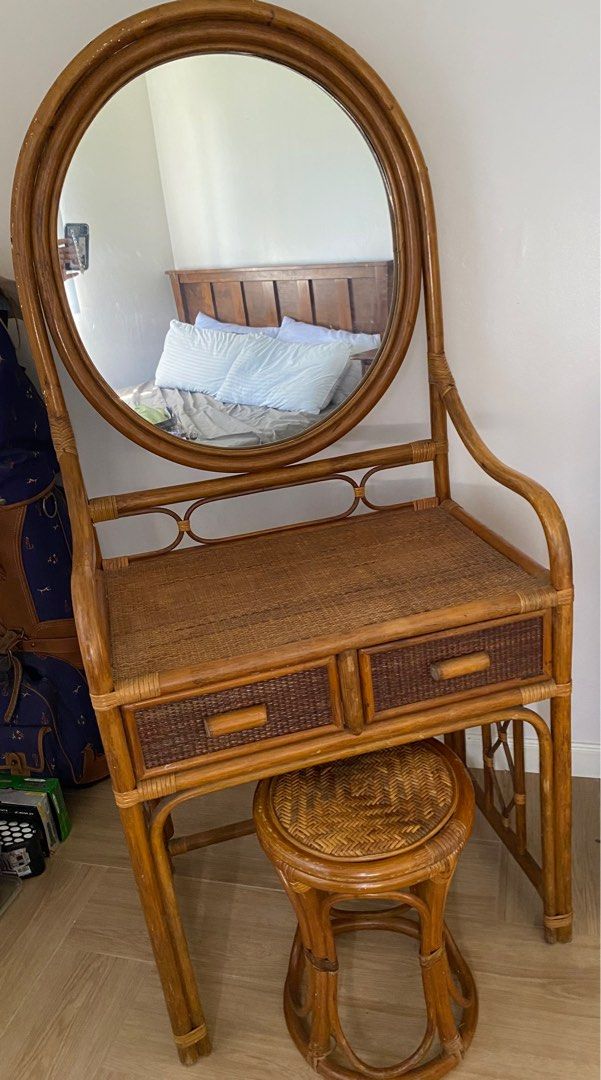 Natural Rattan Vanity Set with Mirror and Stool (Category: Mirrors) located in Paranaque City. Submitted by bloo_berry (Listing ID 1412375538, Image 1). Description: - Natural rattan vanity set - Includes vanity table, mirror, and stool - Features a round mirror and two drawers - Made of woven rattan with a warm, natural finish - Ideal for bedroom or dressing area - Adds a touch of retro style - Approximate dimensions of dresser: L 27.5 x W 15 x 