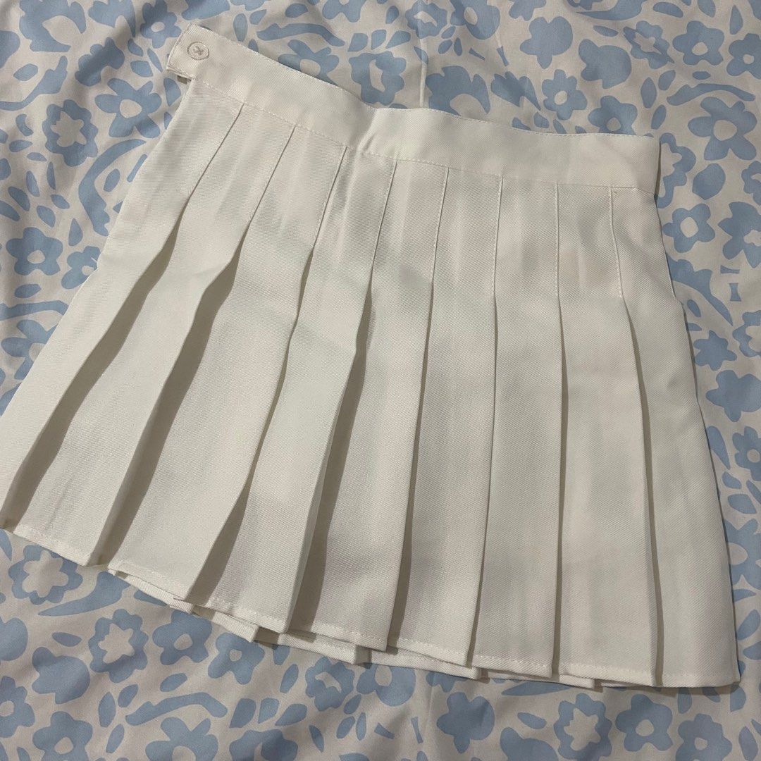 White Pleated Skirt (Category: Skirts) located in Marikina City. Submitted by jellyselection (Listing ID 1412472842, Image 1). Description: - used once - fits 24-26 - has sheer shorts underneath.