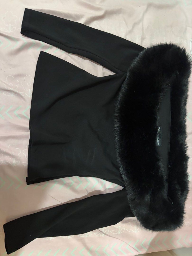 Zara Black Off-Shoulder Top with Fur (Category: Blouses) located in Makati City. Submitted by ryien_ (Listing ID 1412442976, Image 2). Description: - Zara off-shoulder top - Features fur detailing - Long sleeves - Size: M - Made in Cambodia - Perfect for various occasions.