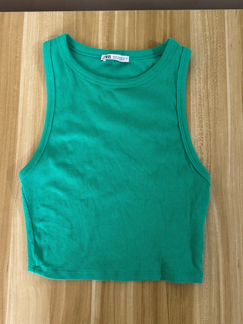 Zara Green Ribbed Tank Top (Category: Sleeveless) located in Quezon City. Submitted by mristl (Listing ID 1412382810, Image 1). Description: - Zara tank top (bought from Zara physical store) - Ribbed texture - Size M (11.5 x 15.5 manual measure).