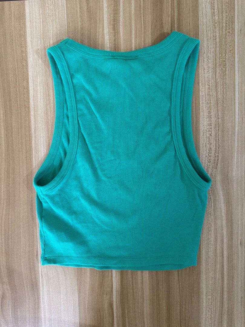 Zara Green Ribbed Tank Top (Category: Sleeveless) located in Quezon City. Submitted by mristl (Listing ID 1412382810, Image 3). Description: - Zara tank top (bought from Zara physical store) - Ribbed texture - Size M (11.5 x 15.5 manual measure).