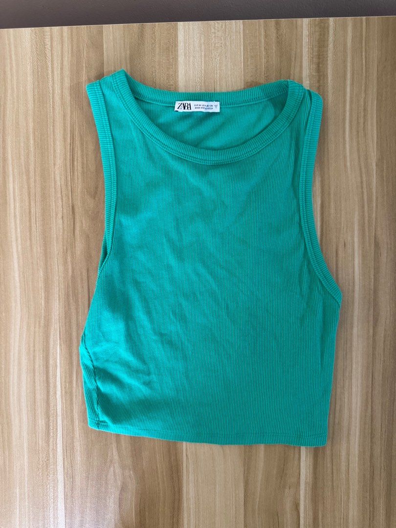 Zara Green Ribbed Tank Top (Category: Sleeveless) located in Quezon City. Submitted by mristl (Listing ID 1412382810, Image 2). Description: - Zara tank top (bought from Zara physical store) - Ribbed texture - Size M (11.5 x 15.5 manual measure).