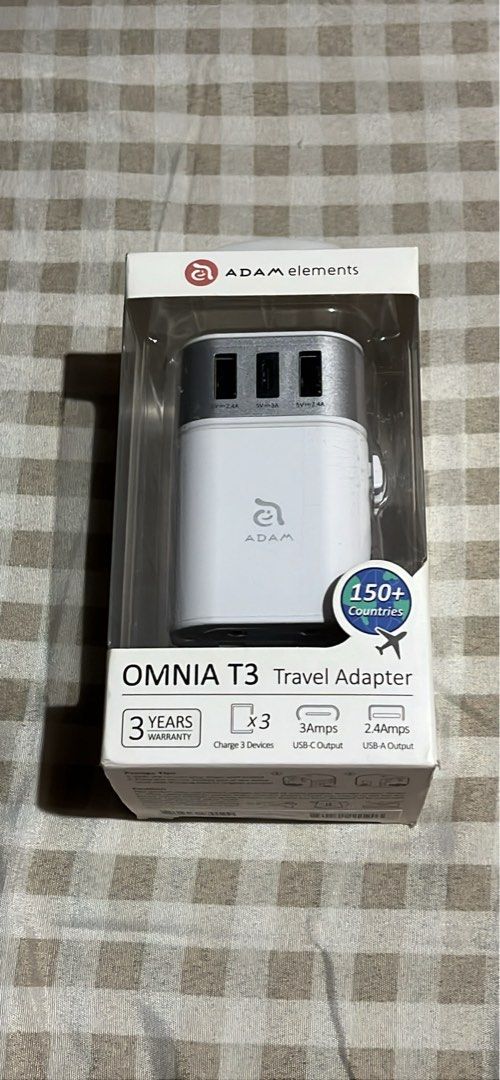 Adam Elements Omnia T3 Travel Adapter (Category: Chargers & Cables) located in Manila. Submitted by heraaa21 (Listing ID 1407703546, Image 1). Description: 【 All-in-one US/UK/EU/AU adapter 】 · Can be used in more than 150 countries. 【 Multi-Charging ports 】 · With two USB-A and one USB-C charging ports. 【 For your safety 】 · 8A/250V Fuse - Surge protector and short circuit protection. 【 Lightweight & Easy to carry 】 · Easy storage and carry pouch