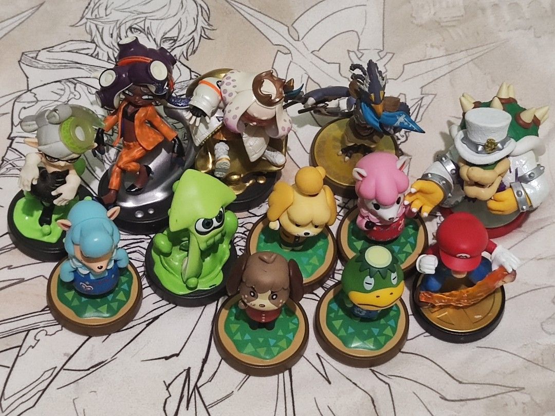 Amiibo 12 pcs WORKING (expect) brown digby animal crossing (Category: Figurines & Statues) located in Manila. Submitted by olx156 (Listing ID 1407660270, Image 1). Description: Brown Digby animal crossing (not working) face dents Mario Smash (fire ball end) dents Marie Splatoon (Splash) need to glued splash at the back .