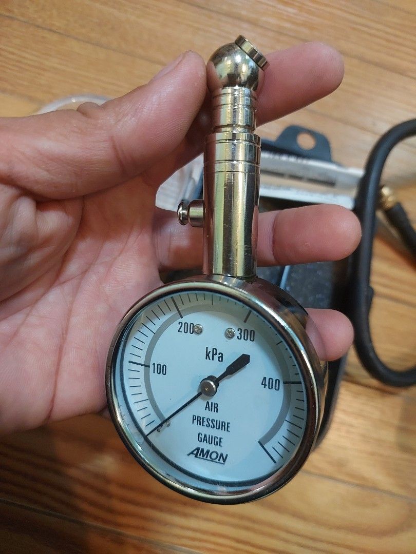 Amon Air Compressor with Pressure Gauge (Category: Construction Tools & Equipment) located in Baliuag. Submitted by papa.gardz (Listing ID 1407628608, Image 2). Description: - Portable 12V DC air compressor - Ideal for car tires - Includes pressure gauge (Amon, kPa) - Features a built-in gauge - Comes with a convenient carrying case.