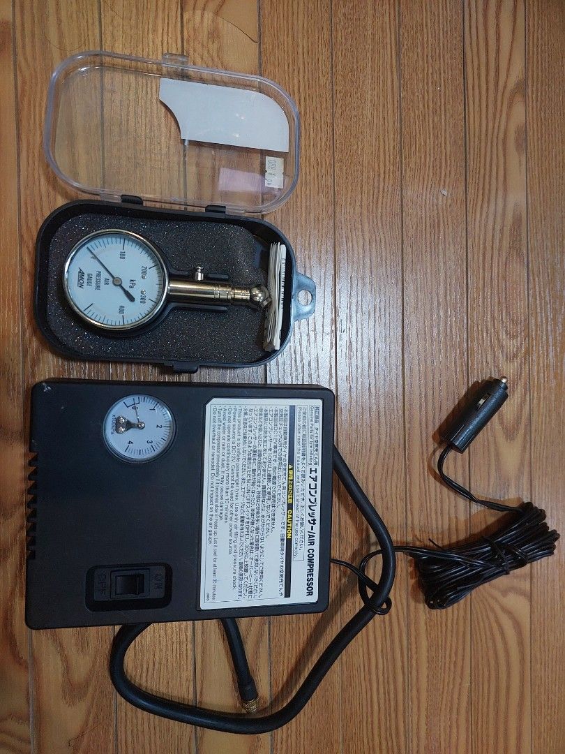 Amon Air Compressor with Pressure Gauge (Category: Construction Tools & Equipment) located in Baliuag. Submitted by papa.gardz (Listing ID 1407628608, Image 3). Description: - Portable 12V DC air compressor - Ideal for car tires - Includes pressure gauge (Amon, kPa) - Features a built-in gauge - Comes with a convenient carrying case.