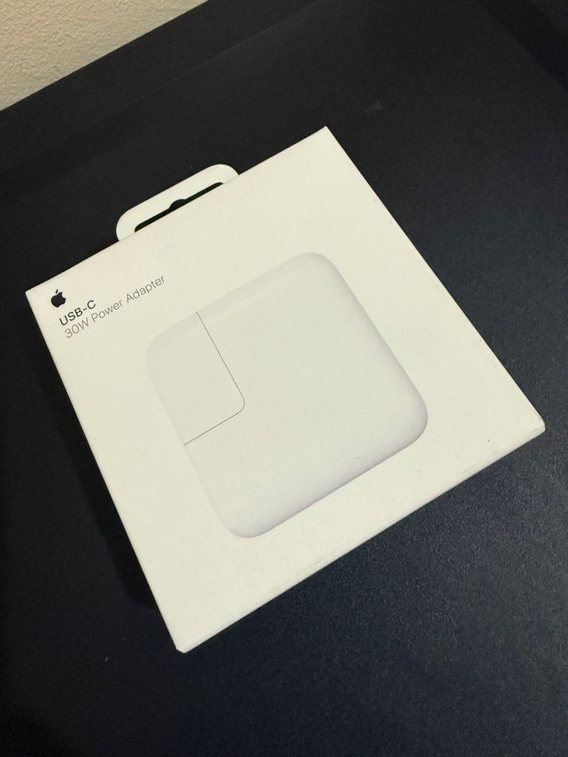 Apple 30W USB-C Power Adapter Original (Category: Chargers & Cables) located in Manila. Submitted by youngwolf-7e1e (Listing ID 1407714470, Image 1). Description: - Original Apple 30W USB-C Power Adapter - Brand new condition - Designed for fast charging - Features a sleek, minimalist Apple design - Compatible with various USB-C devices.