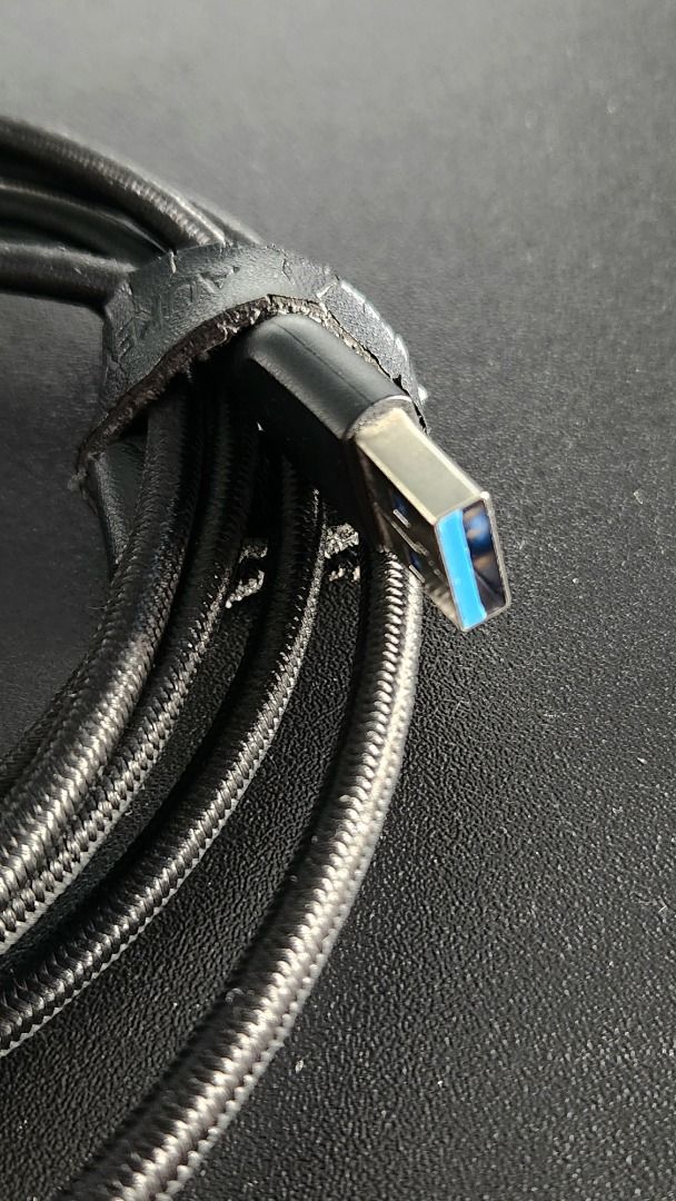AUKEY Braided USB-A to C 2M Cable (Category: Chargers & Cables) located in Makati City. Submitted by abl320 (Listing ID 1407592068, Image 1). Description: - AUKEY 2 meters cord - Durable braided design. - Includes a leather strap with AUKEY logo. - For neat storage..