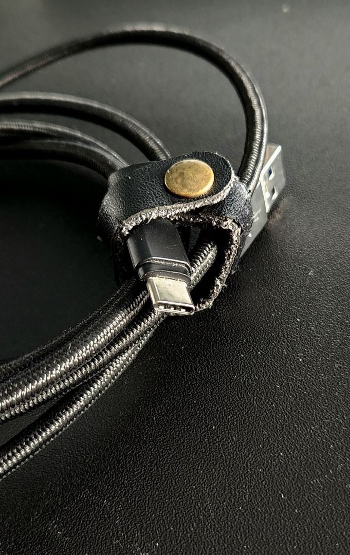 AUKEY Braided USB-A to C 2M Cable (Category: Chargers & Cables) located in Makati City. Submitted by abl320 (Listing ID 1407592068, Image 3). Description: - AUKEY 2 meters cord - Durable braided design. - Includes a leather strap with AUKEY logo. - For neat storage..