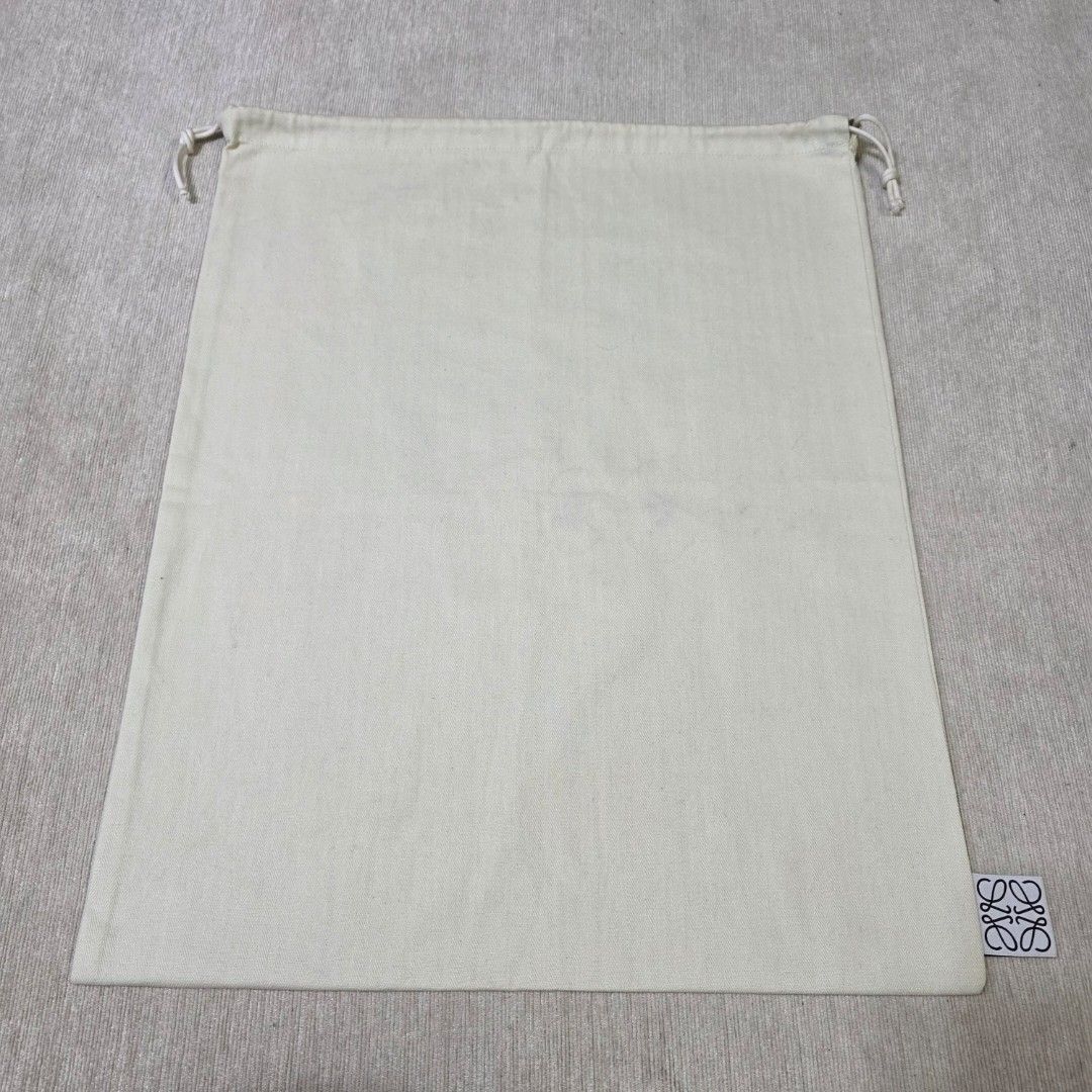 Authentic Loewe dust bag 19x15.5 inches (Category: Cross-body Bags) located in Manila. Submitted by jfluxury.co (Listing ID 1407745256, Image 2). Description: excellent condition no flaws bought in Japan 🇯🇵 💯% Authentic. 😊 Money back guarantee. 😊 Clean and ready to use na.