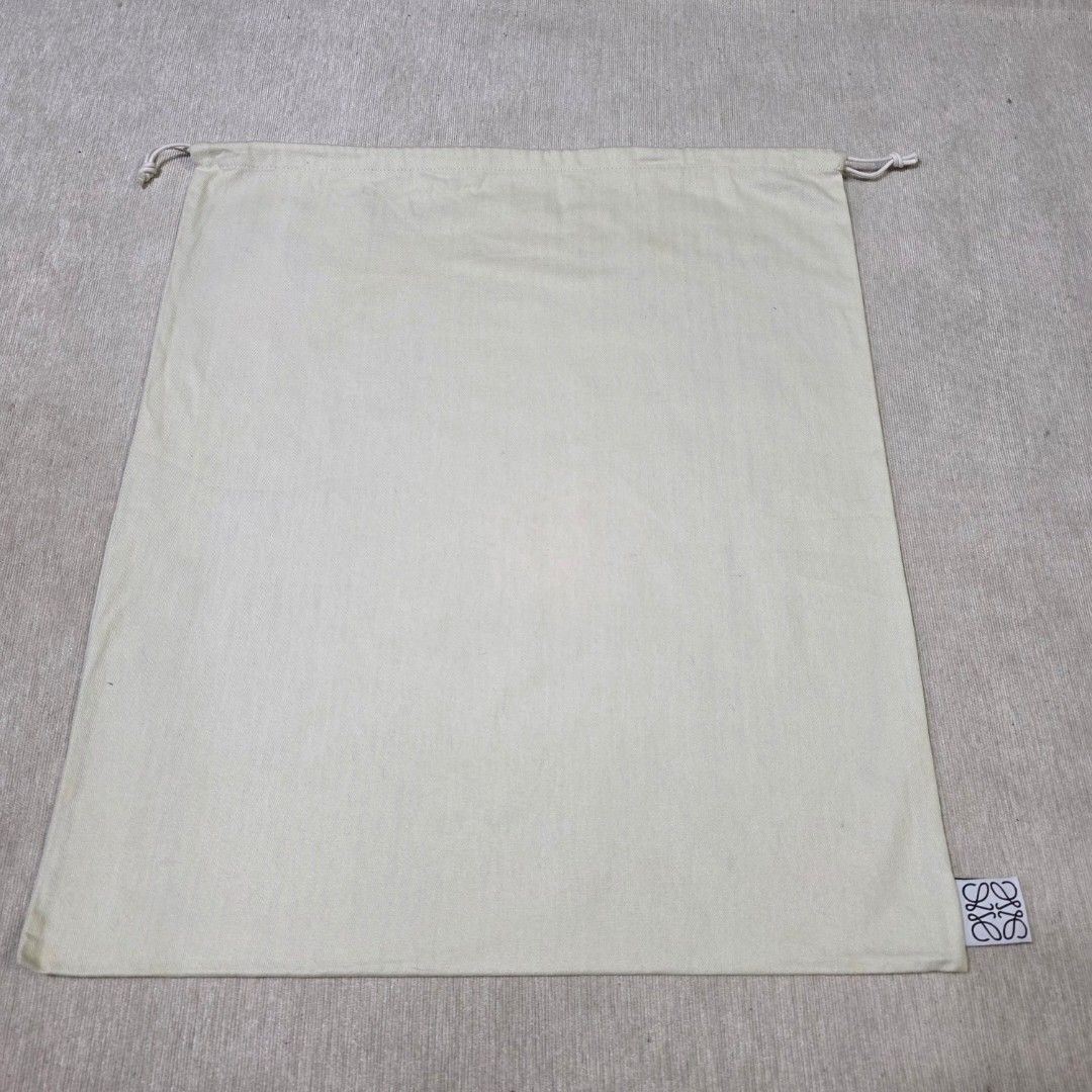 Authentic Loewe dust bag 22.5x19 inches (Category: Tote Bags) located in Manila. Submitted by jfluxury.co (Listing ID 1407745319, Image 2). Description: excellent condition no flaws bought in Japan 🇯🇵 💯% Authentic. 😊 Money back guarantee. 😊 Clean and ready to use na.