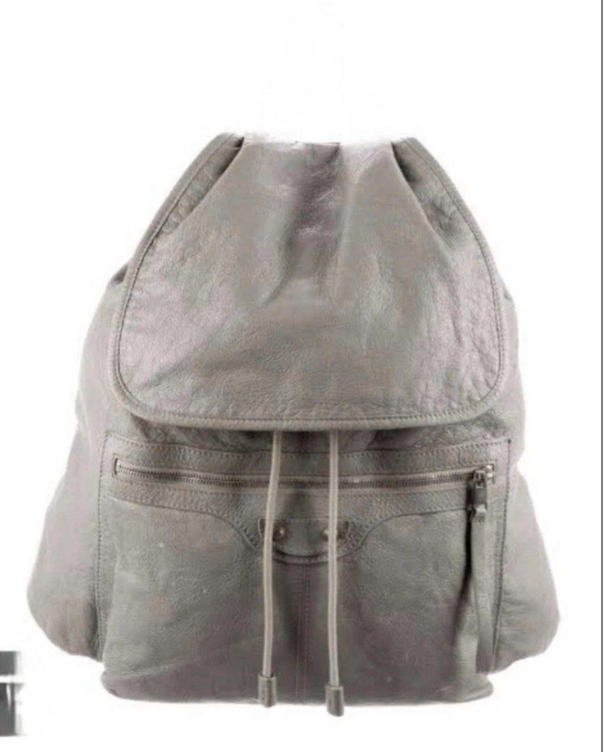 BALENCIAGA ARENA GIANT LEATHER BACKPACK, GRAY (Category: Luxury Bags & Wallets) located in Quezon City. Submitted by carsenmktg (Listing ID 1407583039, Image 1). Description: BALENCIAGA ARENA GIANT LEATHER BACKPACK, GRAY Authentic.used regularly for trips but still in very good condition. Very well taken cared of. bought in London for £775 or about P65,000. No rips, tear, holes or major stains. Missing top handle but not noticeable when worn anyw