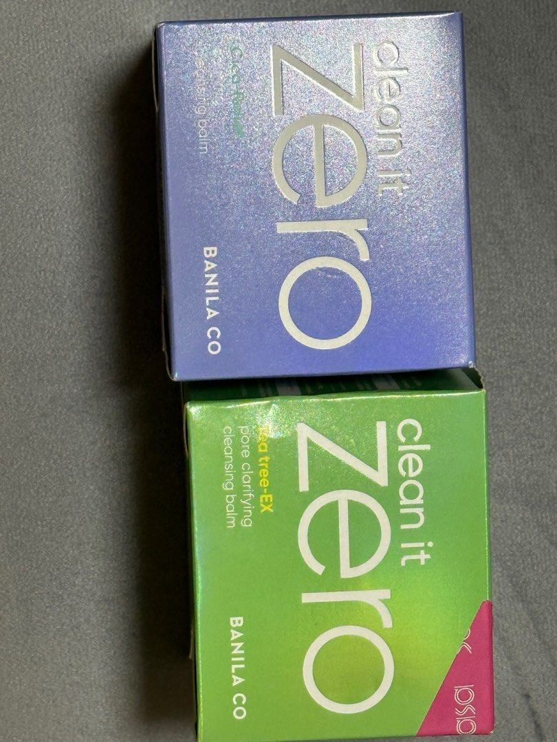 Banila Co Clean It Zero Cleansing Balm (Category: Face Care) located in Quezon City. Submitted by chan61285 (Listing ID 1407689369, Image 2). Description: Two Banila Co Clean It Zero cleansing balms are available. One is the Cica-Relief calming cleansing balm, and the other is the Tea tree-EX pore clarifying cleansing balm. Both are in their original boxes. The expiry dates are May 6, 2027 and July 8, 2027, respectively. Priced at 500php each.