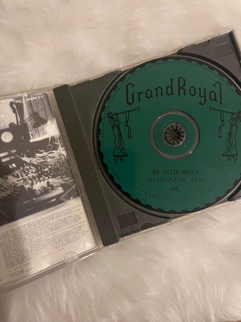 Beastie Boys Ill Communication CD NM (Category: CDs & DVDs) located in Pasig City. Submitted by vr1998 (Listing ID 1407715791, Image 2). Description: - Original "Ill Communication" CD by Beastie Boys. - Includes CD case and disc. - Features hit tracks like "Sabotage" and "Sure Shot". - Back of case shows tracklist and band photo. - A Grand Royal production..