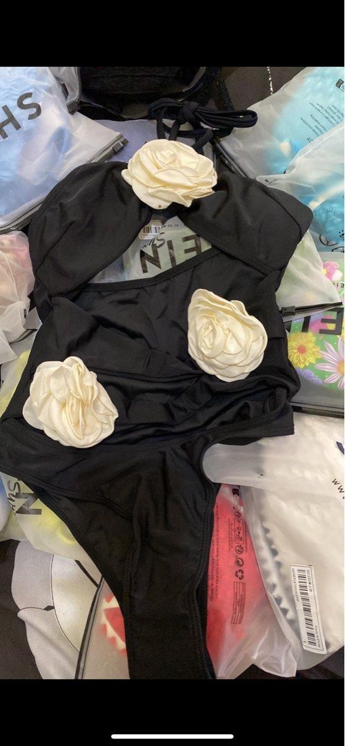Black Floral One-Piece Swimsuit (Category: Bikinis & Swimsuits) located in Pasig City. Submitted by ityah0e (Listing ID 1407737923, Image 1). Description: used once .