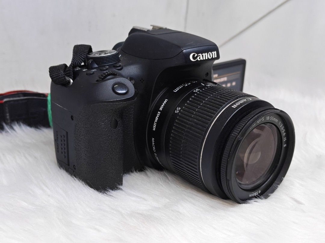 Canon EOS 750D DSLR Camera with Lens (Category: Cameras) located in Manila. Submitted by ultimogizmos (Listing ID 1407693002, Image 3). Description: canon eos 750d Main Features 24MP - APS-C CMOS Sensor ISO 100 - 12800( expands to 25600) 3.00" Fully Articulated Screen Optical (pentamirror) viewfinder 5.0fps continuous shooting FHD at 30fps and HD at 60fps Video Recording Built-in Wireless good as new last price.