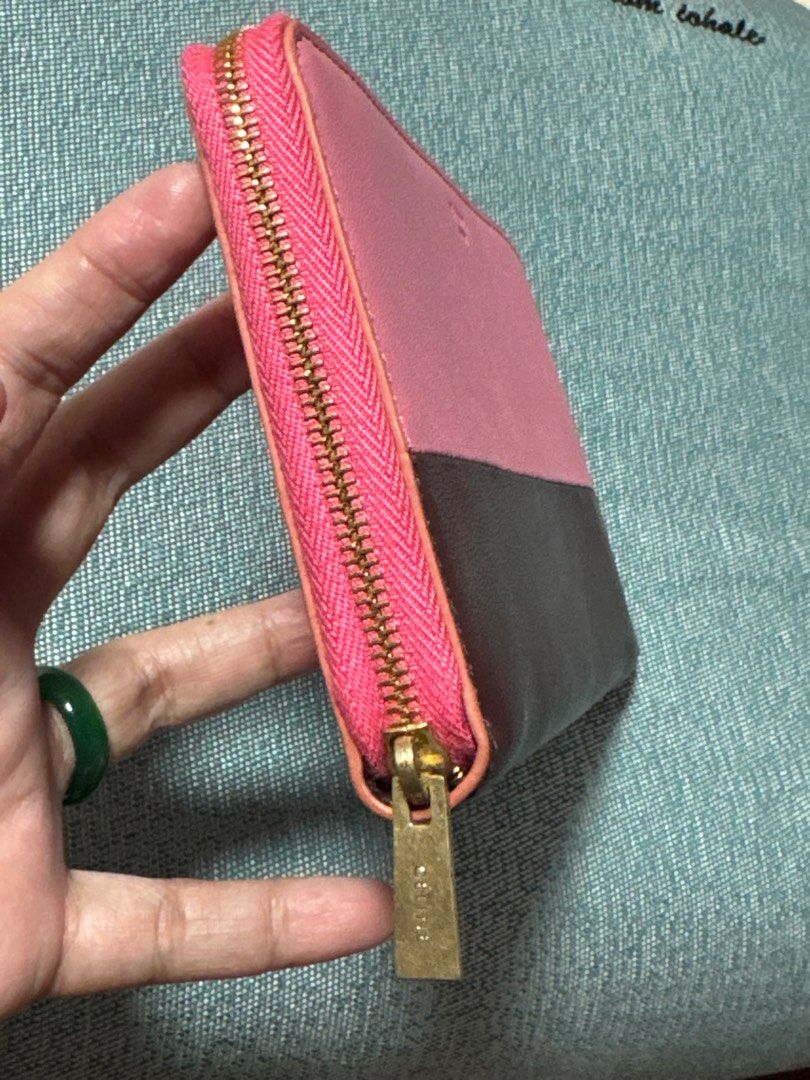 Celine Bi-Color Zip Around Wallet (Category: Luxury Bags & Wallets) located in Davao. Submitted by emeraldjecko (Listing ID 1407582939, Image 2). Description: - Authentic Celine wallet - Bi-color design: Pink and brown leather - Zip-around closure with gold-tone zipper - Interior: Multiple card slots and zippered compartment - Made in Italy.