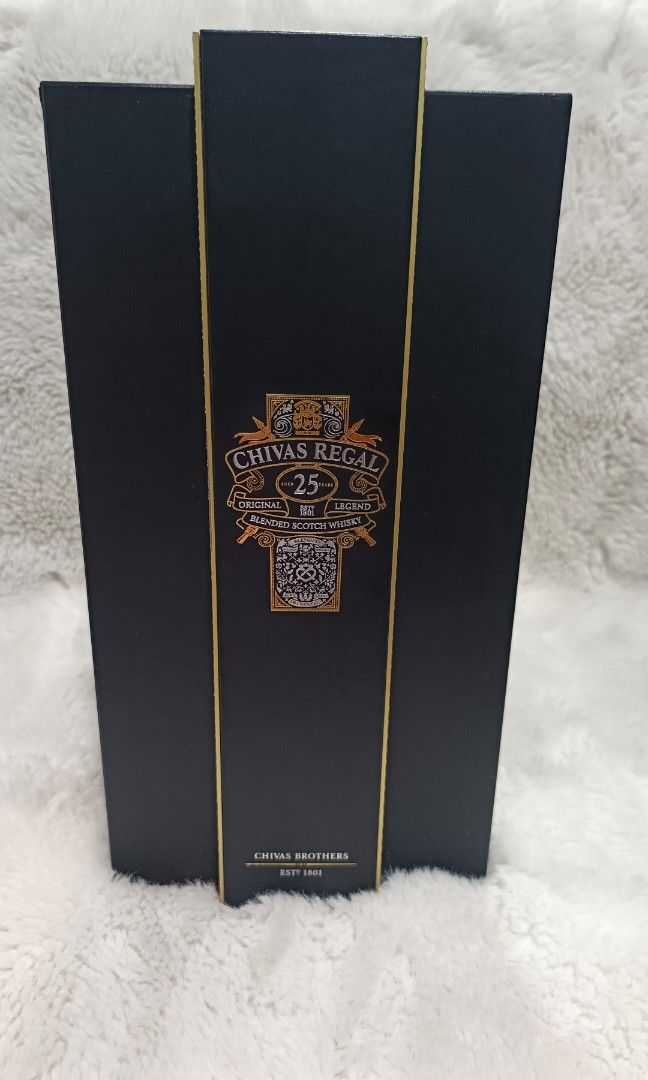 Chivas Regal 25 Blended Scotch Whisky (Category: Beverages) located in Manila. Submitted by vastturtle-53eb (Listing ID 1407631246, Image 2). Description: - Chivas Regal 25 Blended Scotch Whisky - 25 years old - Includes original box - Red-lined box with black exterior - Gold-colored accents.