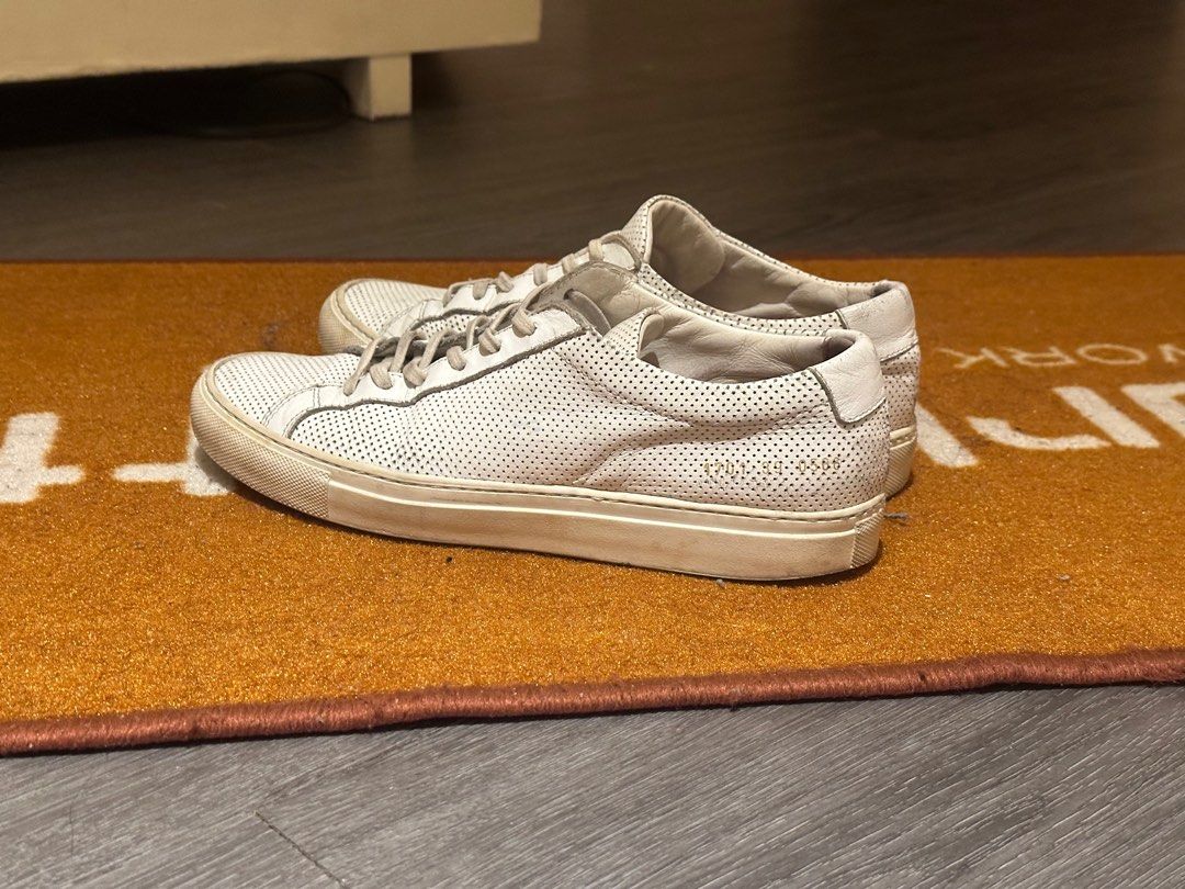 Common projects Achilles size 39 (Category: Sneakers) located in Manila. Submitted by juan_____ (Listing ID 1407723464, Image 2). Description: Common projects Achilles white Size 39 (fits 40) 7/10 condition ( used to be my daily shoes) Shoes only Guaranteed authentic Selling for 1500 only.