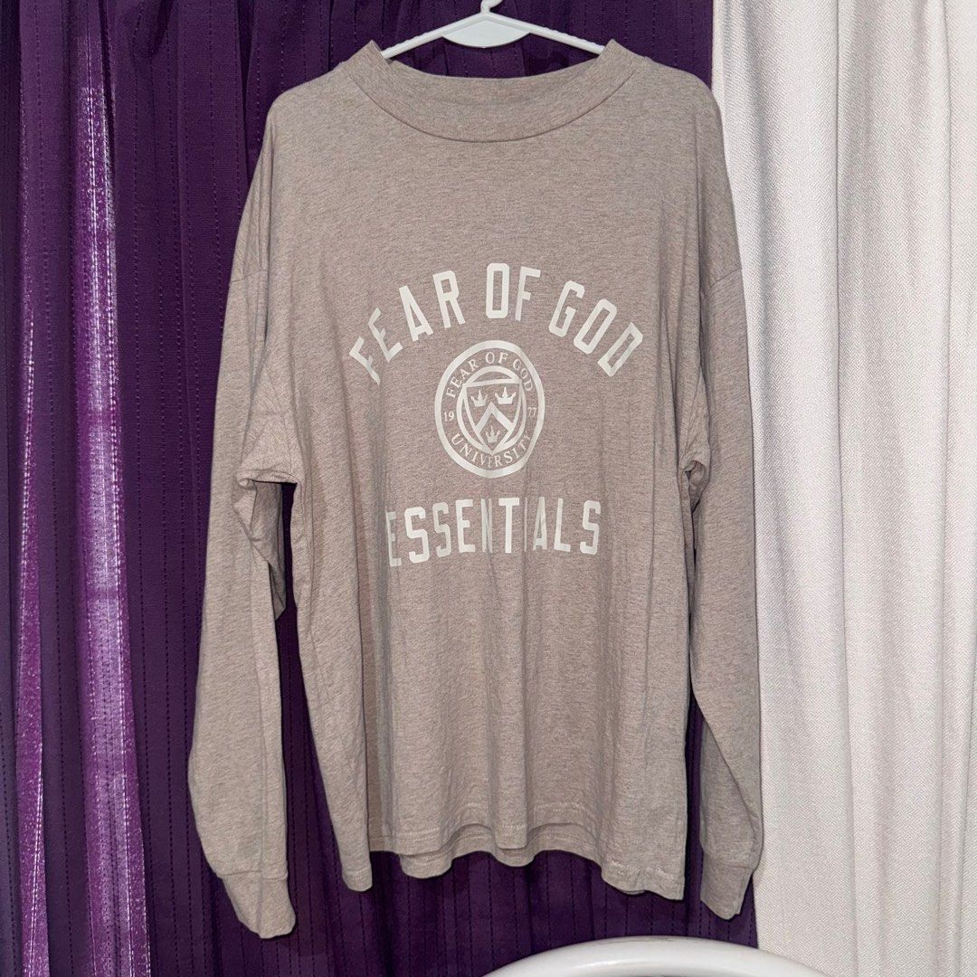 Fear of God Essentials University Long Sleeve Shirt (Category: Tshirts & Polo Shirts ) located in Manila. Submitted by pocochao (Listing ID 1407624650, Image 1). Description: - Fear of God Essentials long sleeve shirt - Crew neck - Long sleeves - Nego price - Dm for deets.
