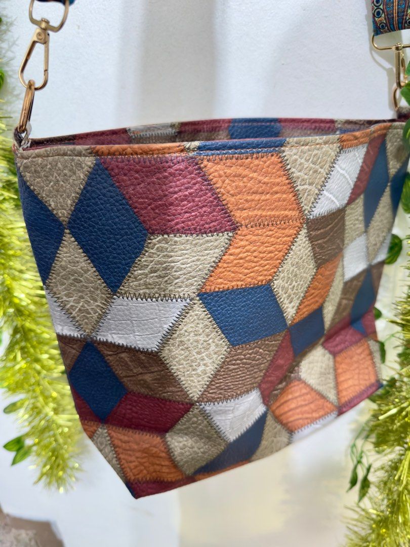Geometric Patchwork Shoulder Bag with removable strap. Can be sling bag. Gift idea. (Category: Shoulder Bags) located in Makati City. Submitted by hello_ph (Listing ID 1407644385, Image 2). Description: Good size: 11.60 in x 10. 80in Perfect for everyday use / doing errand Spacious interior Zipper closure.