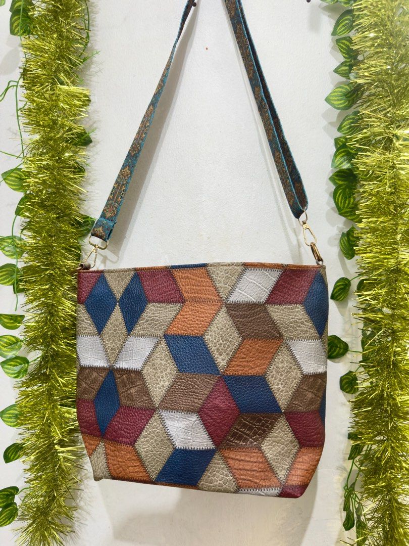 Geometric Patchwork Shoulder Bag with removable strap. Can be sling bag. Gift idea. (Category: Shoulder Bags) located in Makati City. Submitted by hello_ph (Listing ID 1407644385, Image 1). Description: Good size: 11.60 in x 10. 80in Perfect for everyday use / doing errand Spacious interior Zipper closure.