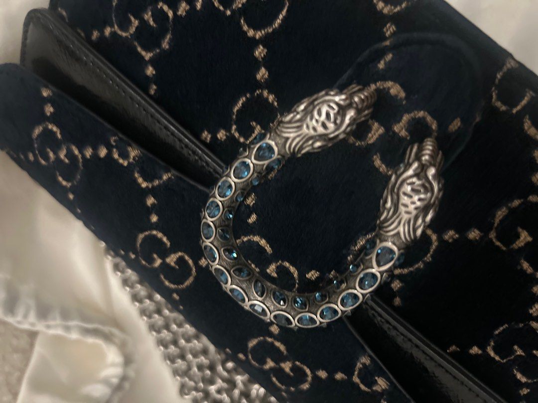Gucci Dionysus Velvet Shoulder Bag (Category: Luxury Bags & Wallets) located in Cavite. Submitted by baglover26 (Listing ID 1407682939, Image 2). Description: - Authentic Gucci Dionysus shoulder bag - Navy velvet exterior with GG pattern - Silver-tone chain strap - Tiger head closure with blue crystal embellishments - Includes white dust bag with Gucci logo.