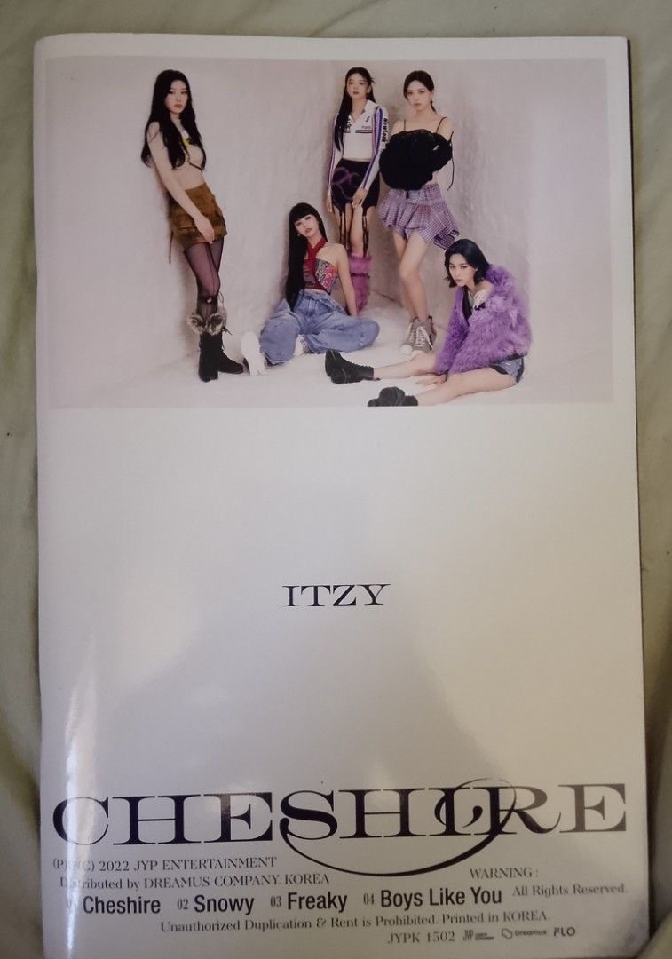 Itzy Cheshire mini album (Category: K-Wave Merchandise) located in Calamba. Submitted by studio11ph (Listing ID 1407658294, Image 1). Description: Itzy Cheshire mini album CD + Photo Album Buy 1 Take 1 Black & White.