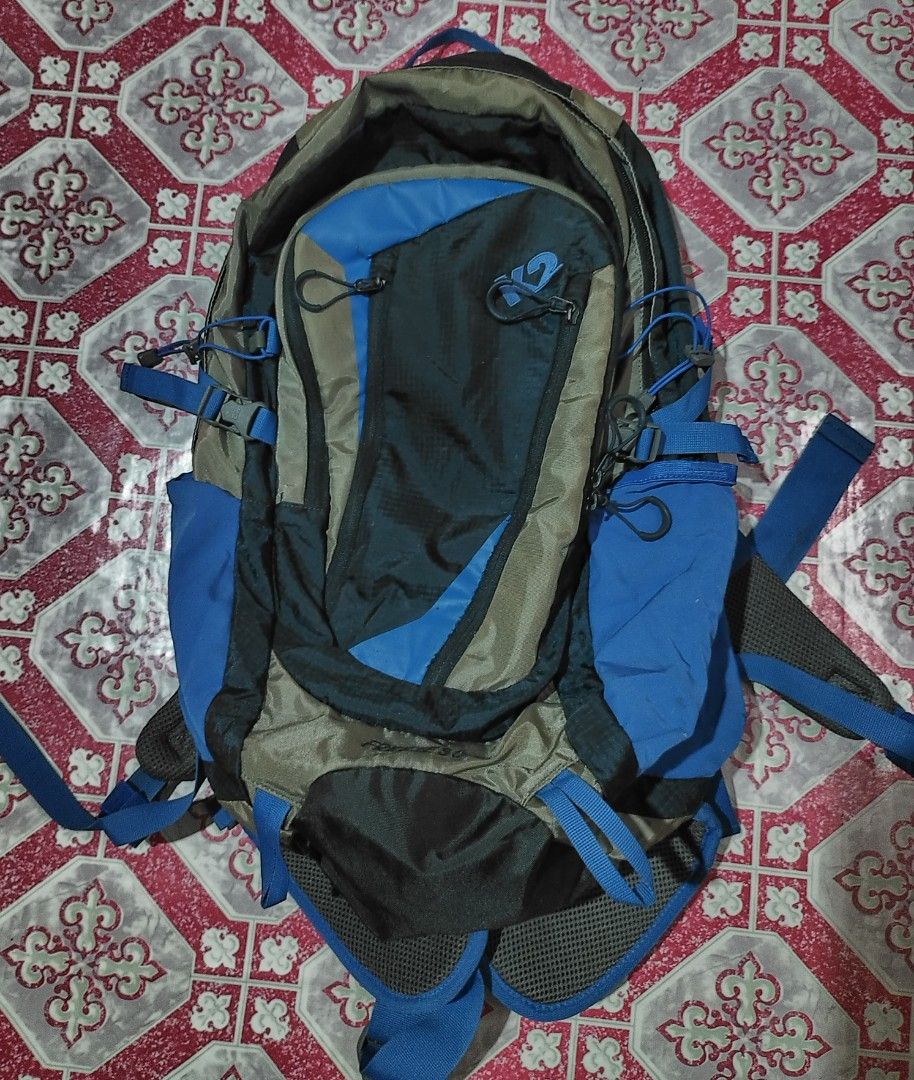 K2 Freeze 30 Backpack (Category: Backpacks) located in Maasin. Submitted by bonitofer (Listing ID 1407620459, Image 1). Description: - K2 Freeze 30L Backpack - Stylish blue and gray color scheme - Features: - Multiple compartments for organization - Adjustable straps for a custom fit - Side pockets for water bottles - Padded back panel for comfort - Waist strap for added support - 30-liter capacity - with rain cover.