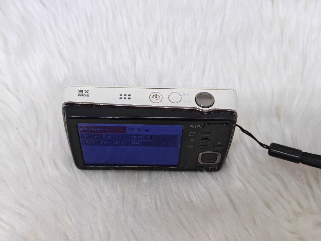 Kodak Easyshare Mini Digital Camera (Category: Cameras) located in Manila. Submitted by ultimogizmos (Listing ID 1407625328, Image 3). Description: - Kodak Easyshare Mini digital camera - 10 MP (4:3) picture size - 3X wide lens - Built-in flash - Includes wrist strap issues: missing batt cover and burn lcd wont affect performance - good lens good autofocus good flash .