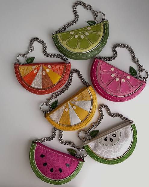 LOOKING FOR Coach Fruit Coin Purse Handbag Charm (Category: Wallets & Card holders) located in Quezon City. Submitted by aeriesell (Listing ID 1407577040, Image 1). Description: Looking for Coach Fruit Coin purse handbag charm, plsss bentahan nyo na mee 🥹 Budget: 1,700 or offer po kayo.