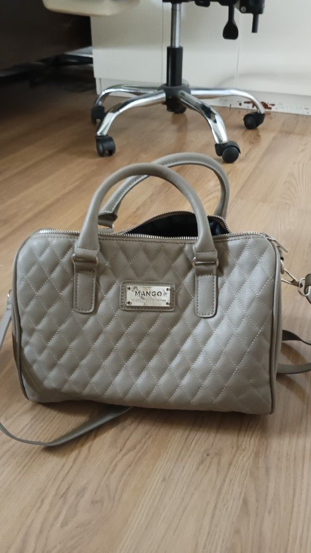 Mango Quilted Handbag (Category: Luxury Bags & Wallets) located in Bacoor. Submitted by fashionpinay (Listing ID 1407750373, Image 1). Description: - Mango handbag with quilted design - Top handles and detachable shoulder strap - Rectangular shape - Zip closure - Mango logo detail - Neutral color.