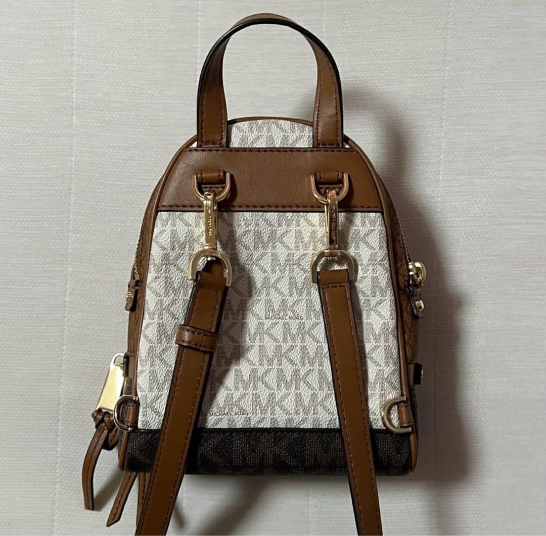 Michael Kors RHEA extra small logo backpack (Category: Luxury Bags & Wallets) located in Las Pinas. Submitted by nicoleiction (Listing ID 1407645516, Image 3). Description: - Michael Kors RHEA extra small logo backpack - Iconic MK logo design - Used only twice - No box or dust bag - Authentic from USA.